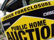 A report released Thursday showed the number of homes in foreclosure continued to decline in Clark County and across the state in October, compared with the same month last year.