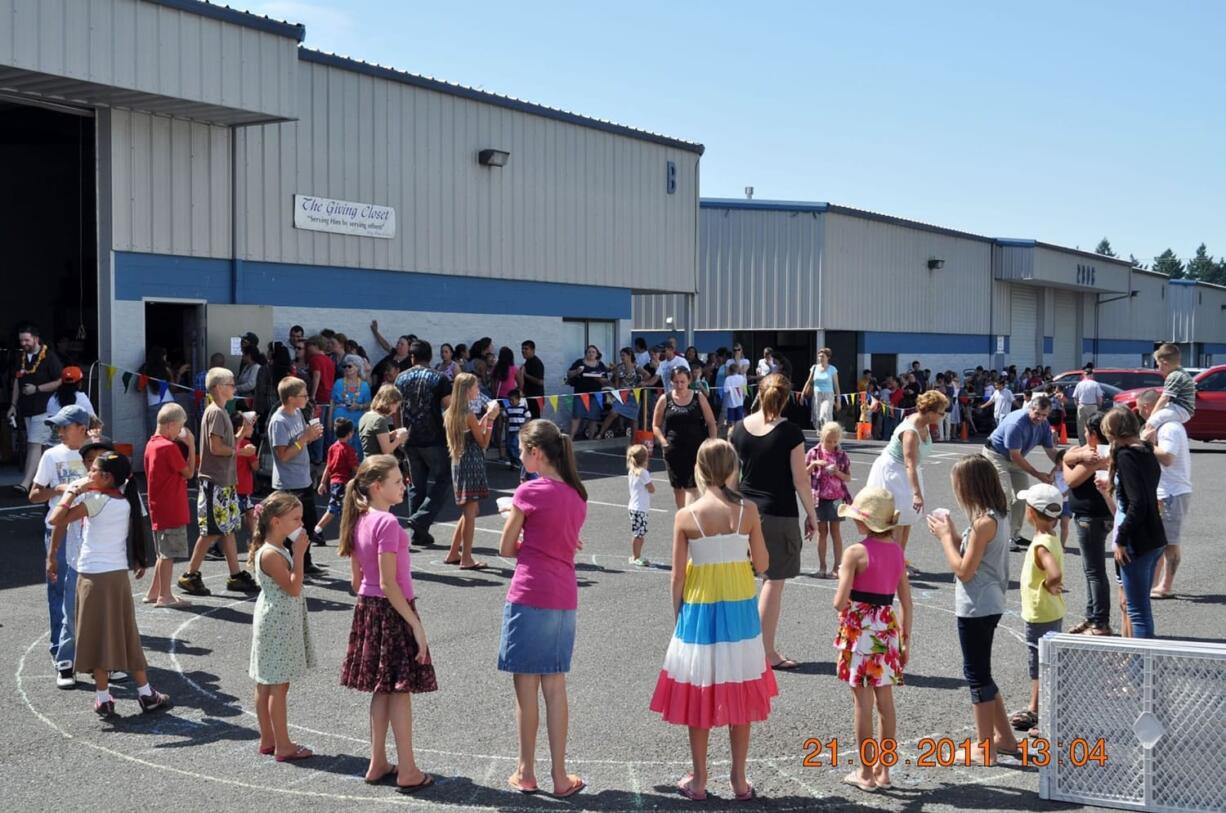 Children played games while The Giving Closet gave away free school supplies to those in need.