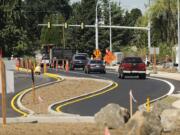 Traffic passes by the main entry of the new C-Tran park and ride, which is still under construction, in Salmon Creek.