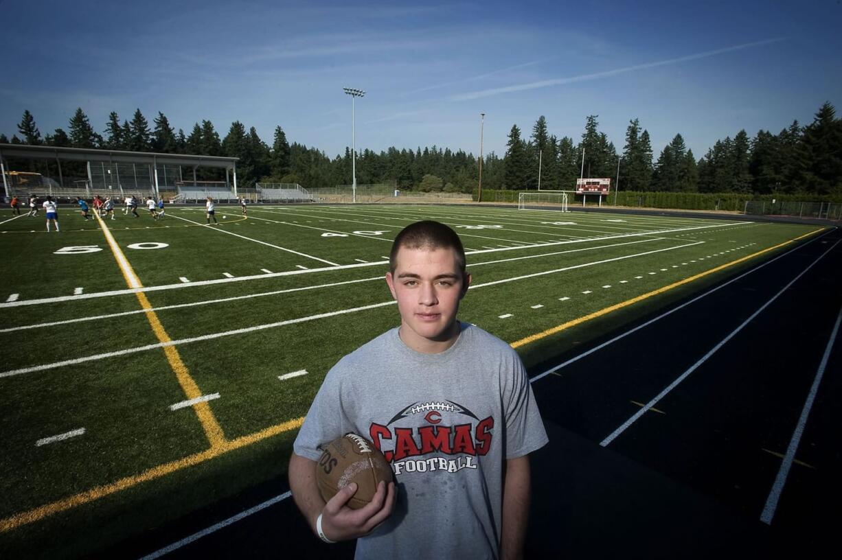 Former Camas football player Ikaika Gunderson had plans to play college ball at Southern Oregon University, but has been sidelined with post concussion symptoms.