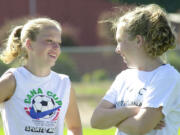 On Sept. 12, 2001, The Columbian ran a feature on Camas' soccer playing sisters Lisa (left) and Shannon Hogan. It was an uplifting change of pace from the disheartening news of the Sept.