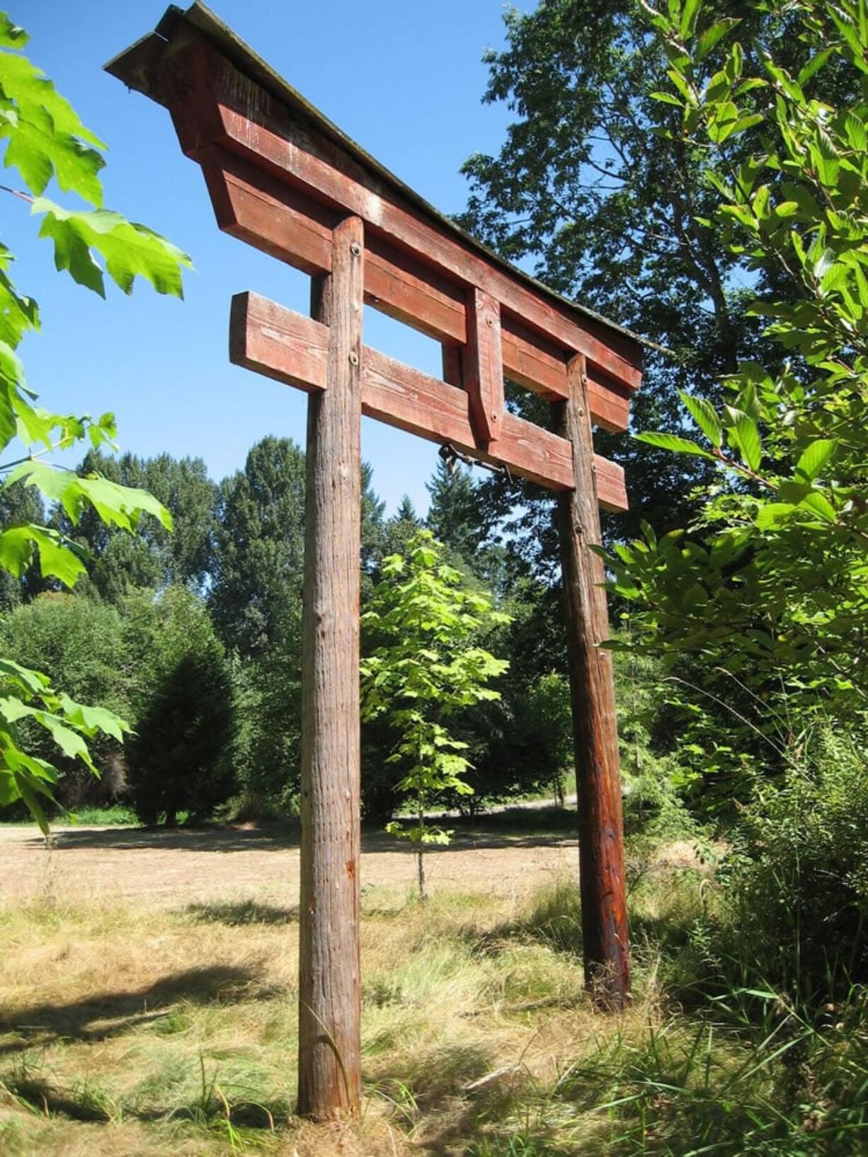 This torii, a Japanese-style gateway that marks the passage from an ordinary space to a special spot, is all that's left of somebody's garden in what has since become Pleasant Valley Park.