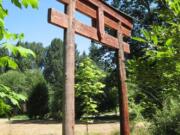 This torii, a Japanese-style gateway that marks the passage from an ordinary space to a special spot, is all that's left of somebody's garden in what has since become Pleasant Valley Park.