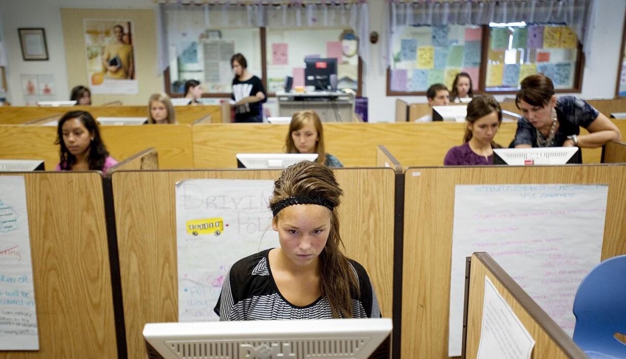 Jessica Dallum, 16, a junior at Prairie High School, takes part in the Microsoft IT Academy at the Clark County Skills Center on Tuesday.