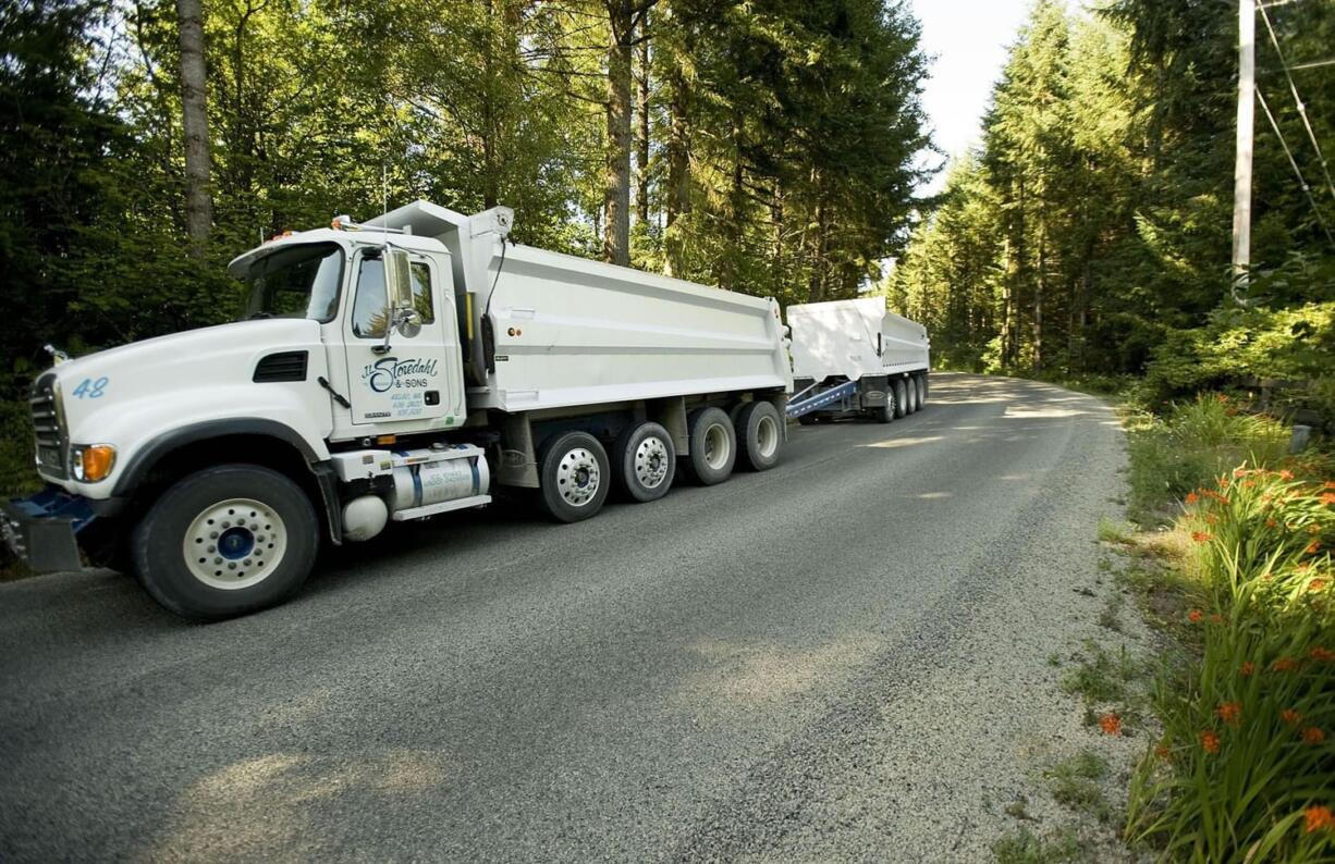 A J.L. Storedahl &amp; Sons truck hauls gravel from the Yacolt Mountain Quarry on Northeast Kelly Road.