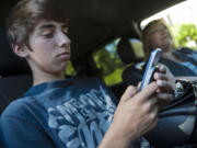 Brandon Gonzales, 12, has been using a cell phone since he was 10. Almost all of his friends have cell phones, too.