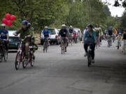 Clark County residents, including members of the county's Youth Commission, ride north on Northeast 17th Avenue in Portland while participating in a Sunday Parkways ride. The event closes streets to vehicles as a way to encourage people to explore their neighborhoods.