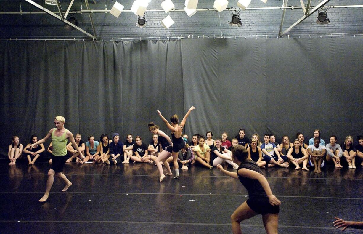 About 20 Heritage High dance students take part in a special workshop Wednesday put on by Pilobolus dance troupe at Body Vox Dance Center in Portland.