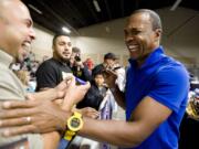 Boxing legend Sugar Ray Leonard greets fans and signs autographs Saturday at the Vancouver PAL Fight Night at the Clark County Event Center.