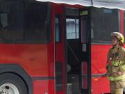 Firefighter Garrett Riley inspects the new canopy on the Clark County Fire &amp; Rescue rehabilitation bus.