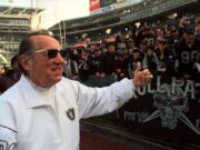 Al Davis, greeting the Raider faithful at a game in 1998.