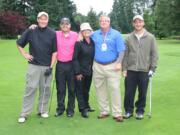 The Emerick Construction Team joins with host Keith Knight of Cherry City Electric at the Third Annual Charity Golf Tournament.