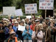 An estimated 700 demonstrators gathered at downtown's Esther Short Park to participate in Occupy Vancouver, one of 951 cities that rallied against corporate power Saturday.