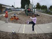 Chanelle Paschal, 4, kicks a soccer ball during outdoor activity time at Ellsworth Head Start Friday.