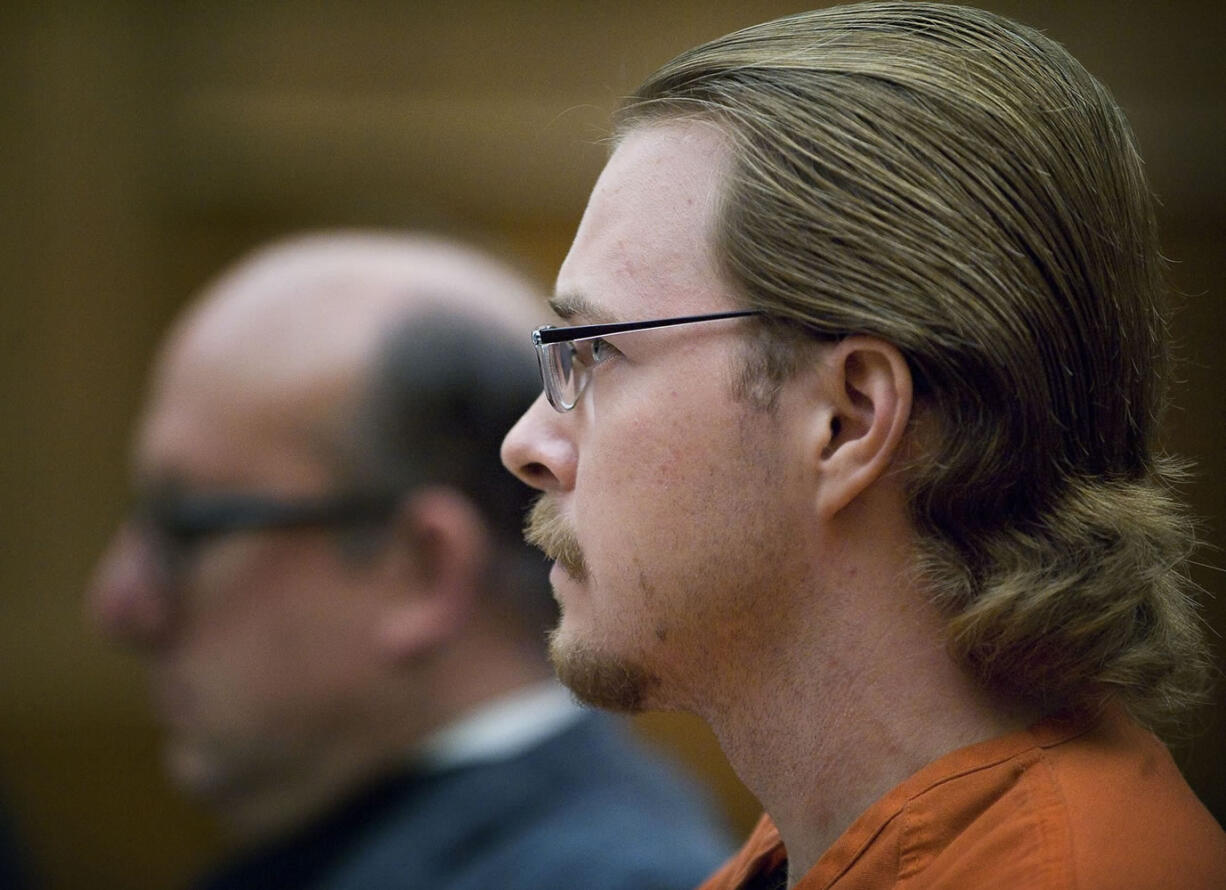 Jay Rich, convicted of murdering his co-worker at a Battle Ground Safeway in 2001, was resentenced Friday to a reduced sentence of 28 years in prison because of a legal loophole on exceptional punishments.