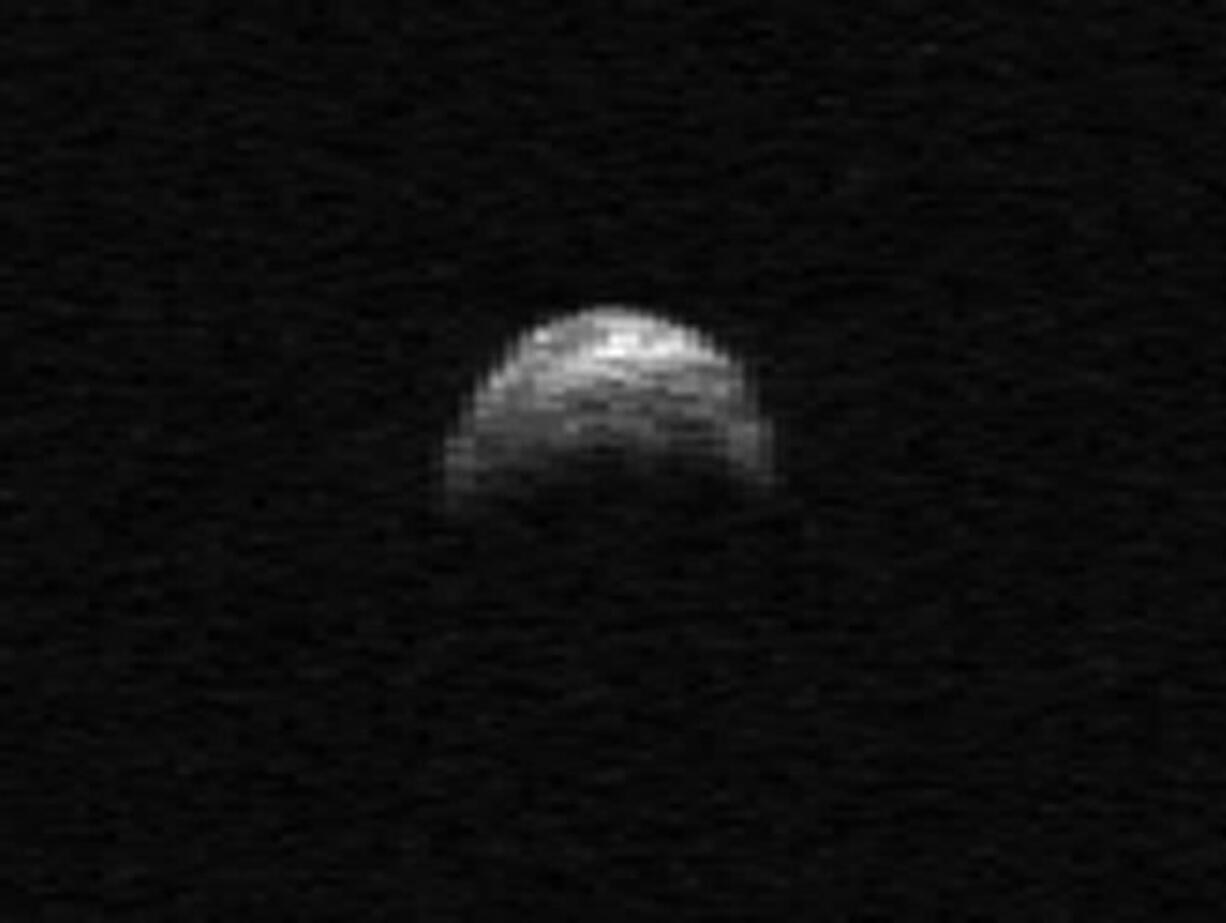 This image made from radar data taken in April 2010 by the Arecibo Radar Telescope in Puerto Rico and provided by NASA/Cornell/Arecibo shows asteroid 2005 YU55. The asteroid, bigger than an aircraft carrier, will dart between the Earth and moon Tuesday -- the closest encounter by such a huge rock in 35 years. But scientists say not to worry.