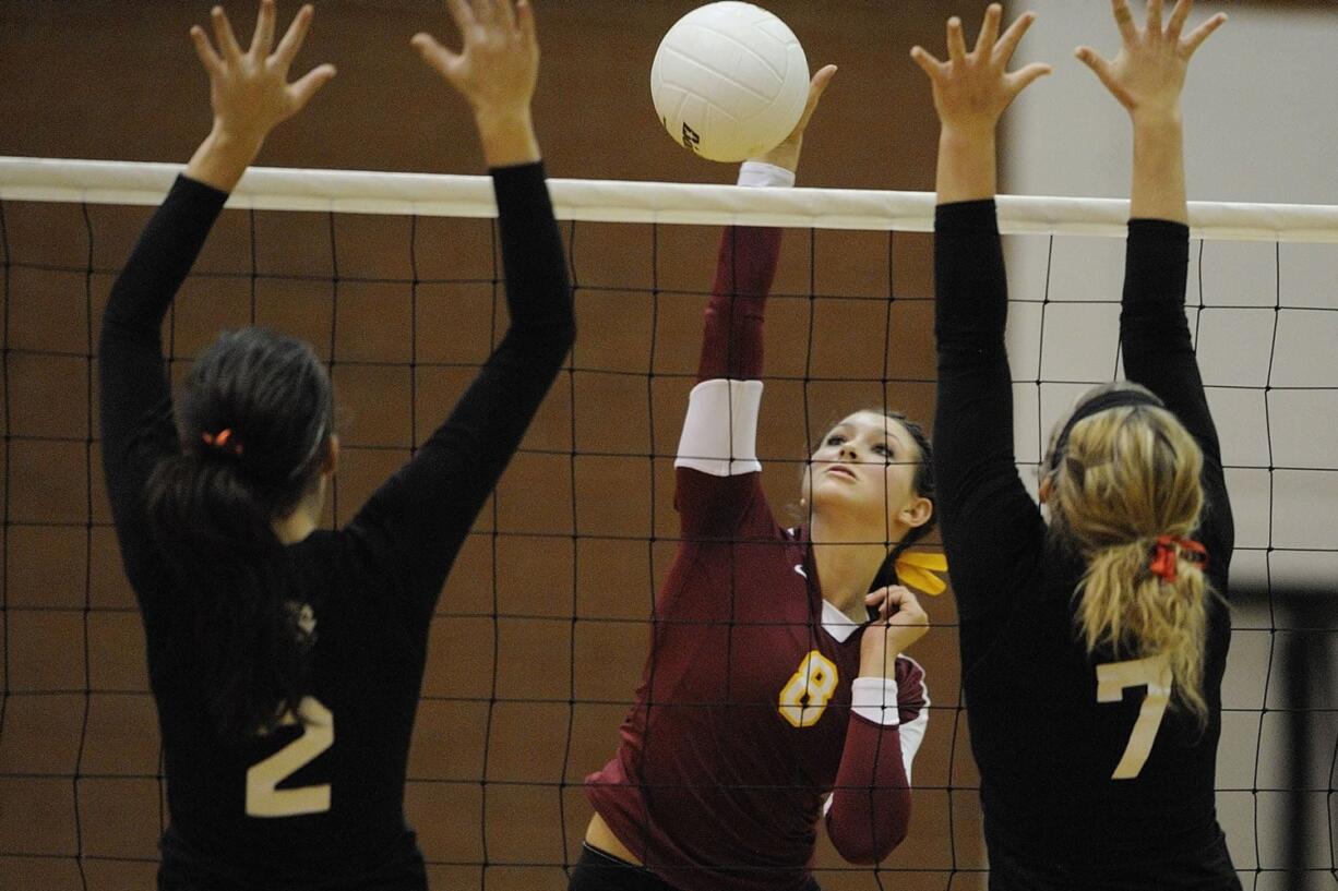 Kaylee Warren, 8, and the Prairie volleyball team won the district title and then went to place fifth at the 3A state tournament.