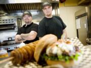 Coachmen restaurant owners Michael Horn, left, and Kevin Basarab say their focus on fresh, local ingredients have helped make their restaurant a success in its first year.