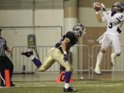 Skyview's Reiley Henderson (3) catches a touchdown pass over Christian Gasca.