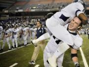 Skyview's Riley Bockmier, giving a lift to C.J.