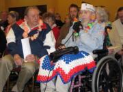 John Leach, right, tells how he ran up to the deck of the battleship USS California on Dec. 7, 1941, without putting on his pants.