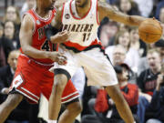 Portland's LaMarcus Aldridge, right, helped convince Kurt Thomas, left, to become a teammate and not a foe.