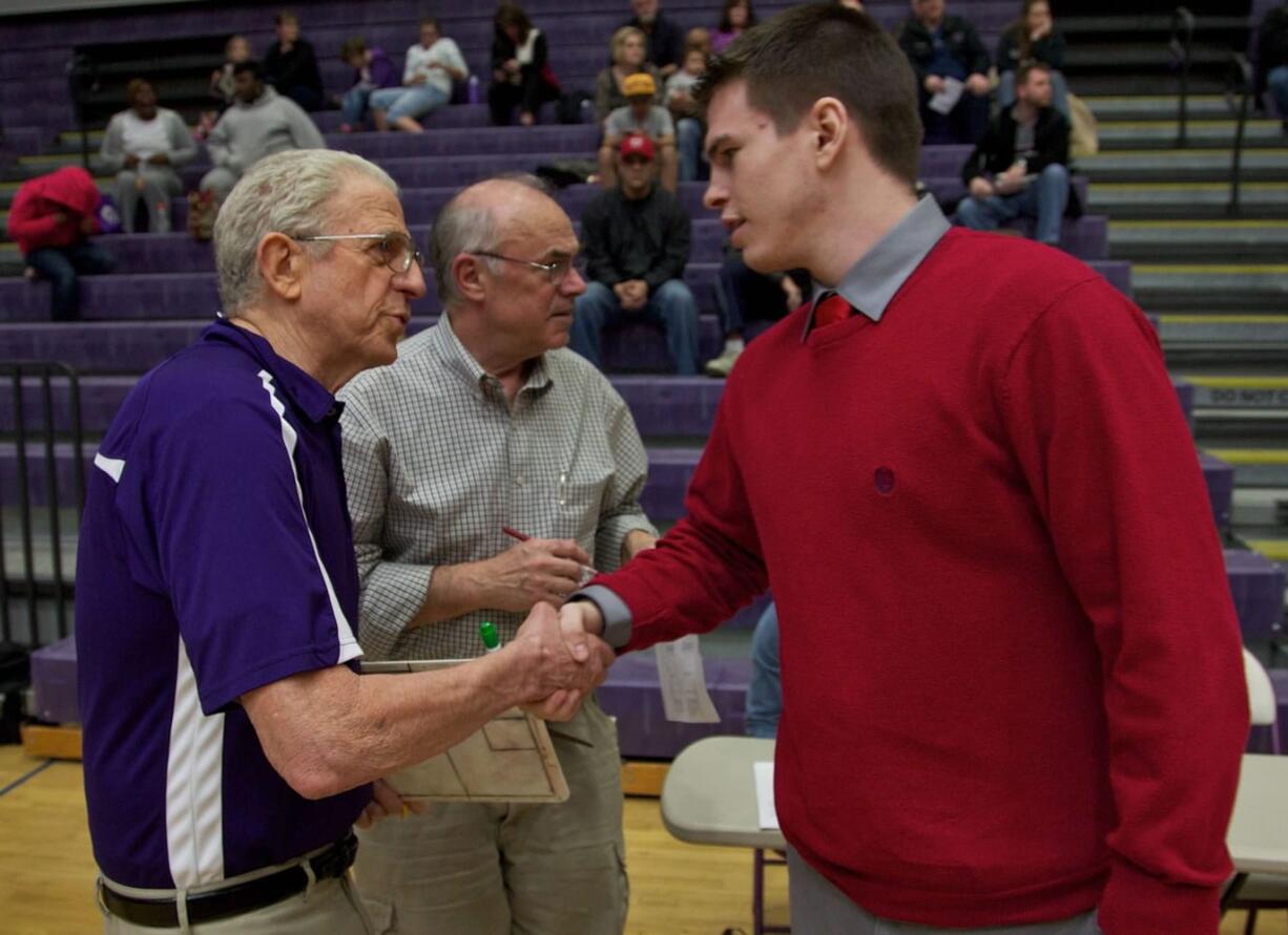 When Camas boys basketball coach Skyler Gillispie, right, was born, Heritage boys basketball coach Forbes Lapp already had 30 years of coaching under his belt.