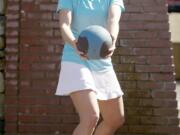 WEEK 6 SPRING TRAINING BASEBALL n MEDICINE BALL SIDE TOSSES n Sherri McMillan demonstrates exercises you can do outdoors as part of an eight-week fitness program.