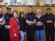 Esther Short: Fort Vancouver Lions Club presented homemade cookies to Vancouver Fire Station 1 in conjunction with First Responders Day.