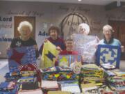 Felida: The Blessed Piecemakers quilters donated 100 doll blankets to Neighbors Helping Neighbors.