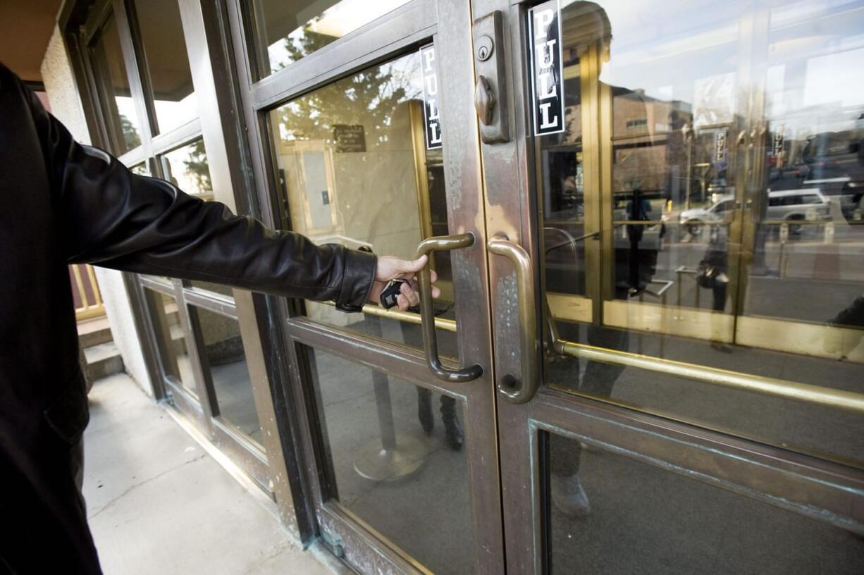 The brass-trimmed front doors at the 1940 Clark County Courthouse could be restored, along with other brass fixtures, with help from a state historic rehabilitation grant.