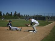 Sophomore James Brooks slides in to third base while fellow sophomore Alec Chaney awaits the throw as Skyview prepares for the school's first appearance in the state baseball tournament.