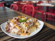 Pastrami fries at Rose&#039;s Restaurant, Bakery and Bar in Vancouver are hearty enough to pair with a salad to make a meal.