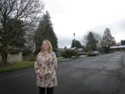 Ila Stanek, president of the West Hazel Dell Neighborhood Association, stands March 1 near a state-funded home for teen boys who are unable, for whatever reason, to be placed in foster homes.