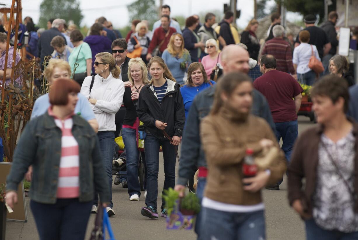 Visitors enjoy the Home &amp; Garden Idea Fair on Saturday.