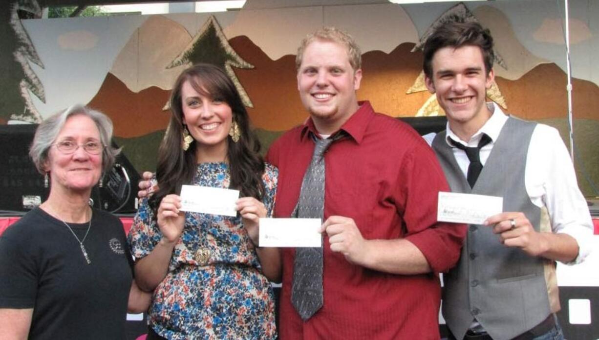 VanMall: Winners from the 2011 Southwest Washington's Got Talent Contest received prizes from Rotary Club president Richela Grantz on left.