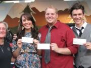 VanMall: Winners from the 2011 Southwest Washington's Got Talent Contest received prizes from Rotary Club president Richela Grantz on left.