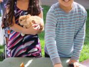 Glenwood: Jissel Valenca, 8, and Anthony Santoyo, 10, enjoy stroking soft, fuzzy bunnies at the Latino Resources Fair on April 15.