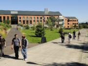 Students make their way between classes at Washington State University Vancouver as classes started Aug.