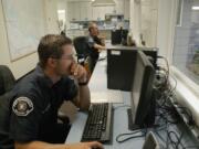 Firefighter-paramedic Kevin Stromberg, left, and Capt. Carl Murray fill out reports at Fire Station 6 after going out on a call Monday morning.