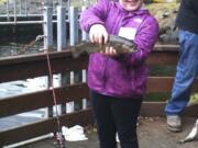 Charlie Downs is proud as can be of her haul at Kids Fishing Festival.