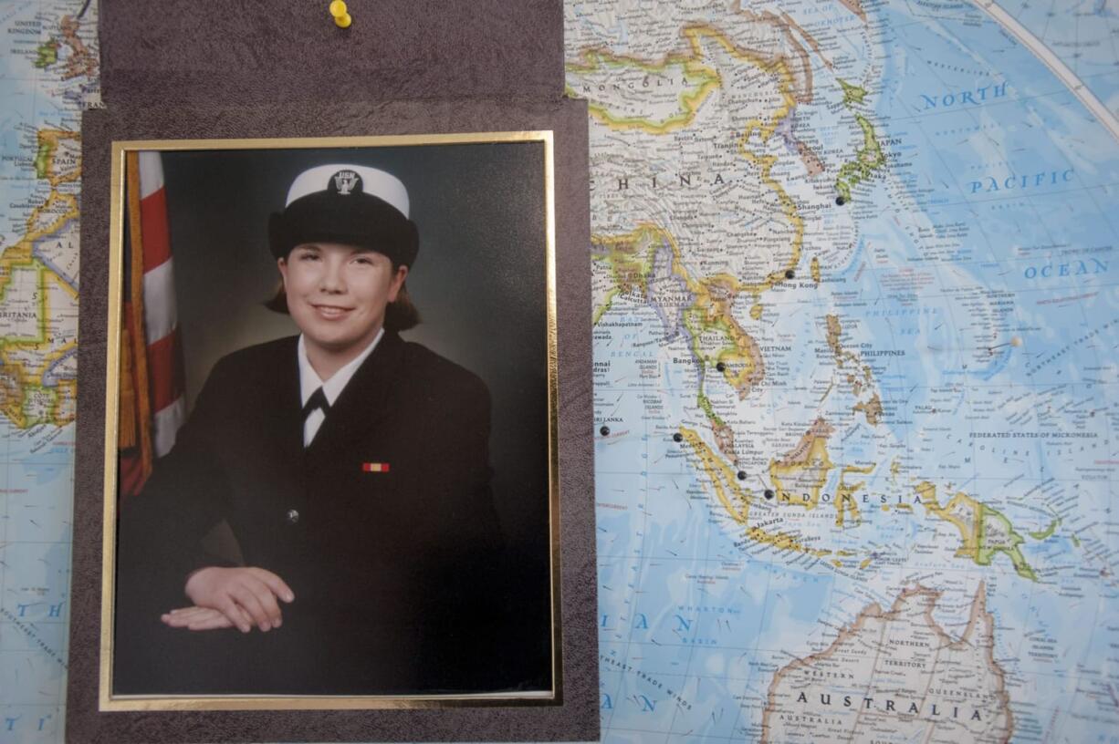 A map in the her parents&#039; home pinpoints ports that 2002 Camas High School graduate Liz Stanton has visited during her Navy career.