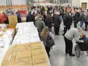 It was a little hard to find space to walk inside the new Clark County Food Bank warehouse and distribution center on Tuesday -- the floor was so full of visitors and Walk &amp; Knock donations.