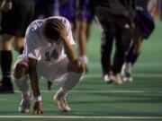 Union's Davis Strawn reacts after missing a shootout attempt as Issaquah beats the Titans in the state playoffs.