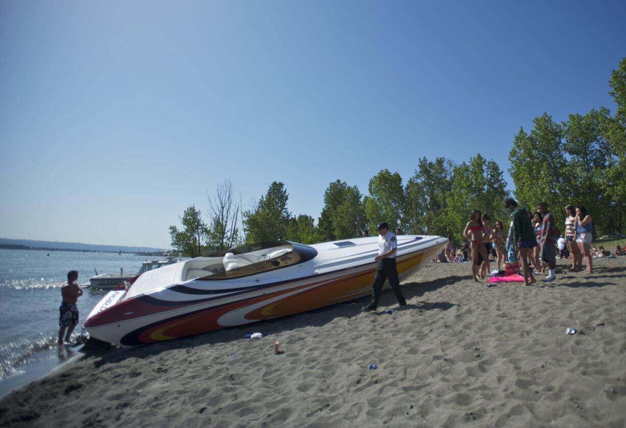 Police investigate a boating accident at Wintler Park on Saturday.