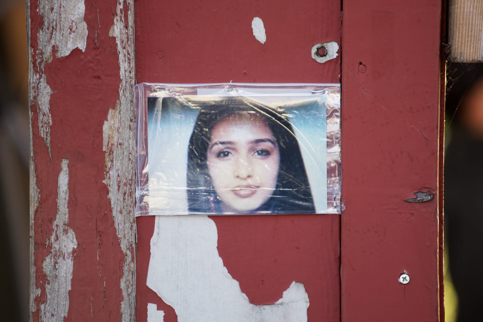 Steven Lane/The Columbian
A photograph of Maria Delos-Carrasco Angulo, is shown at a memorial vigil Friday night outside Becerra's Plaza in Vancouver. Angulo died Thursday after a car struck her as she walked in a crosswalk on Fourth Plain Boulevard.