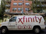 A Comcast van is parked  in downtown Vancouver in July 2011.