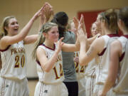 Prairie celebrates after beating Camas to win the championship at the  GSHL 3A Basketball Tournament at Fort Vancouver High School, Friday, February 10, 2012.