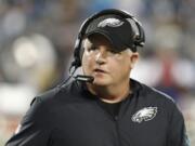 FILE - In this Oct. 25, 2015, file photo, Philadelphia Eagles head coach Chip Kelly watches the action from the sidelines in the first half of an NFL football game against the Carolina Panthers in Charlotte, N.C. The San Francisco 49ers have hired Chip Kelly as their new head coach. CEO Jed York announced the move on Twitter and so did the team.