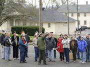 Bob Cromwell, an archaeologist with the National Park Service, points out a historical building during a tour of the East Barracks.